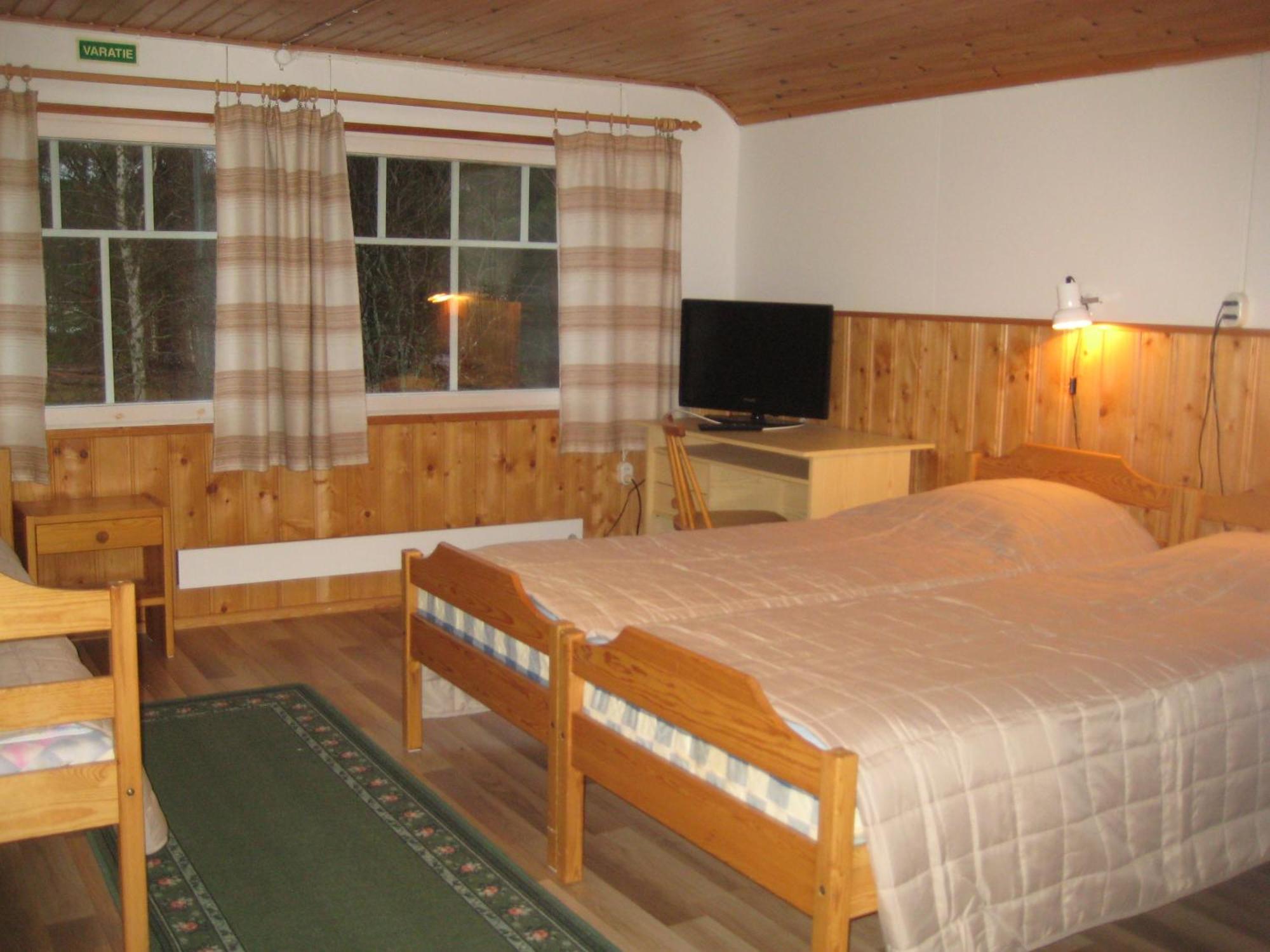 Rinnepelto Holiday Cottages Тахковуори Номер фото